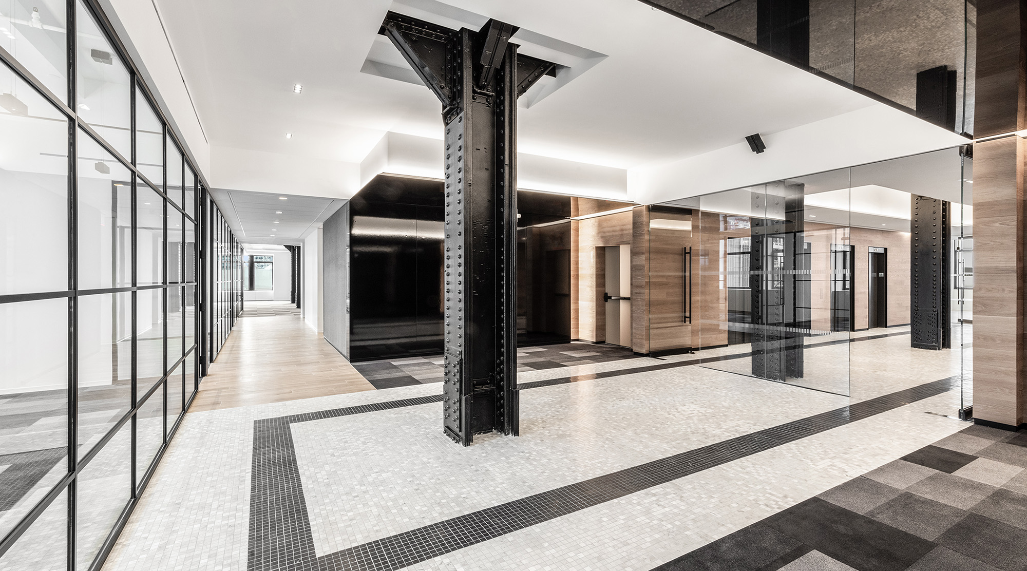 Black and white commercial space with black metal pillar